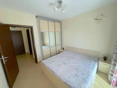 a bedroom with a large bed in a room at Sun and Sea A22 in Sunny Beach