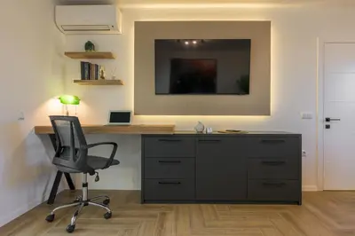 an office with a desk and a chair in a room at INCANTO Residence in Varna City