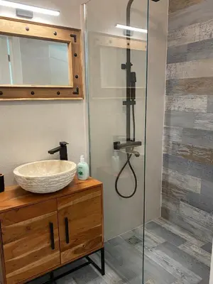 a bathroom with a sink and a shower at Coastal home Arapya in Tsarevo