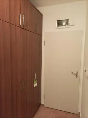 a room with a closet and a door next to a door at Марина Кеѝп, Ахелой in Aheloy