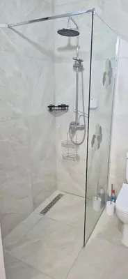 a shower stall in a bathroom with a toilet at JADORE DUNE Apartment 9 Sunny Beach in Sunny Beach