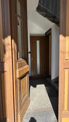an entrance to a room with a door and a hallway at Top Floor Two Bedroom Apartment in Central Burgas in Burgas City