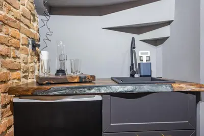 a kitchen with a counter top and a sink at Skyler 9 in Varna City