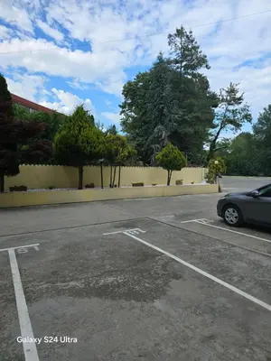 a car parked in a parking lot at Несебър Златна Дюна in Nesebar