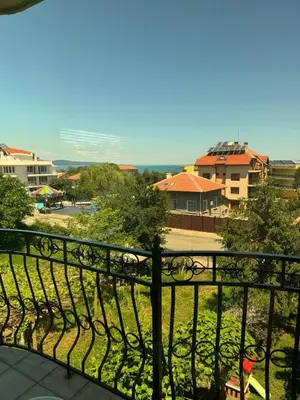 a view of a city from a balcony at Хотел Грация in Lozenets