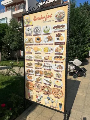 a sign for a restaurantart with food on it at Studio near the center in Sunny Beach