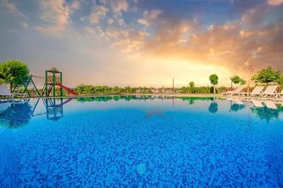 a large swimming pool with a slide in the middle at Studio near the center in Sunny Beach