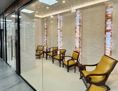 a row of chairs and tables in a waiting room at Flores Gardan ART Studio in Chernomorets