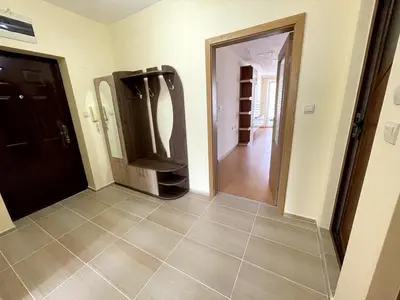 a hallway with a large mirror and a hallway with a hallway at 2BR Garden Bay Apartment in Varna City