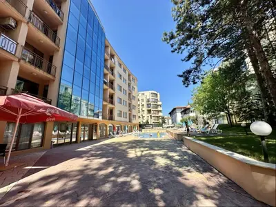 an empty street in front of a building at Sunny Sea - Menada Apartments in Sunny Beach