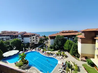 an aerial view of a resort with a swimming pool at Апартамент в Комплекс Райска градина in Sveti Vlas