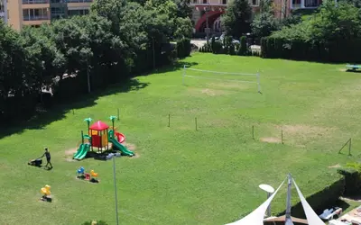 an aerial view of a park with a playground at 2-bedroom Apartment in Marina Holiday Club Pomorie in Pomorie