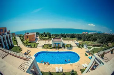 an overhead view of a swimming pool in a resort at Imperial Sea View in Burgas City