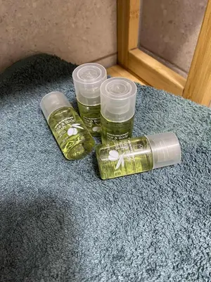 three plastic containers sitting on the floor next to a window at Уют и тишина на топ локация in Varna City