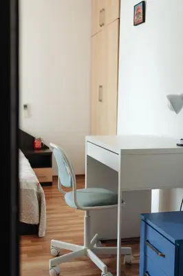 a desk with a chair next to a white desk at Mirage Collective in Nesebar