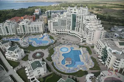 an aerial view of a resort with a pool at Сънсет резорт Поморие in Pomorie