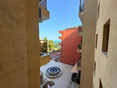 an overhead view of a courtyard between two buildings at South Beach Vigo Studio in Nesebar