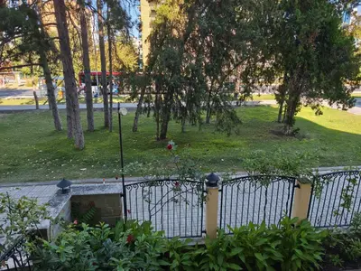 a park with a fence and some bushes and trees at Royal Sun - Vaio - 1BR Apt with Balcony in Sunny Beach