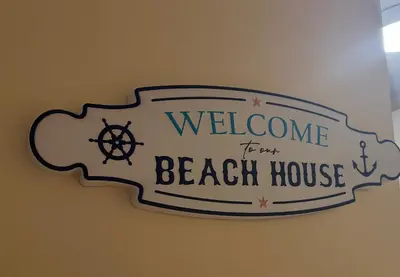 a sign that reads welcome for a beach house at Elegant studio - 100 m from Smokinya Beach by Flat Mаnager in Sozopol