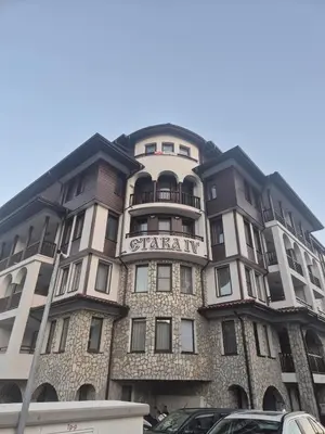 a large apartment building with a sign on it at Etara 4 in Sveti Vlas
