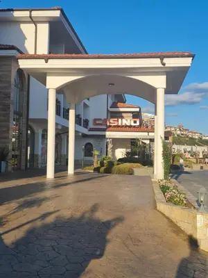 a gas station with a sign in front of it at Etara 4 in Sveti Vlas
