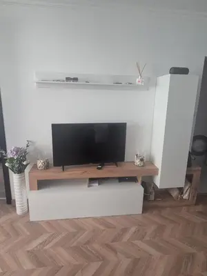 a television on a stand in a living room at Etara 4 in Sveti Vlas