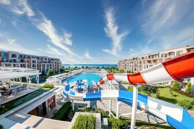 a water park at a resort with a water slide at Premier Fort Beach in Sveti Vlas