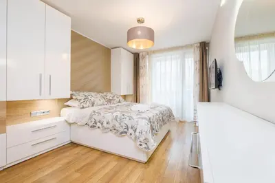 a bedroom with a bed and a window at Sam Centre Harmony 1-Bedroom in Burgas City