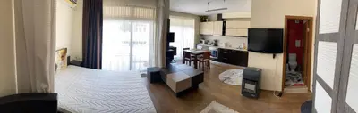 a room with a kitchen and a living room at Luxury Studio B02 SB in Sunny Beach