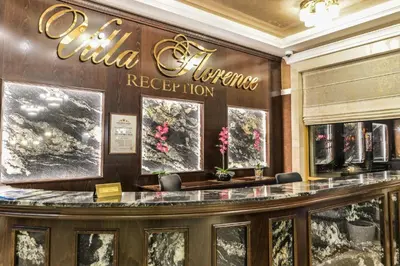 a lobby of a hotel with a reception counter at 2-Bedroom Apartment in Villa Florence Boutique ApartHotel in Sveti Vlas