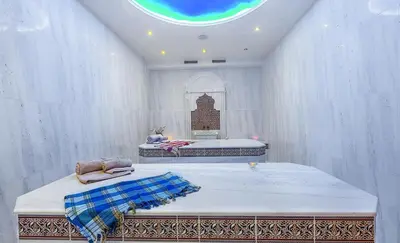 a bedroom with two beds and a window in the ceiling at 2-Bedroom Apartment in Villa Florence Boutique ApartHotel in Sveti Vlas