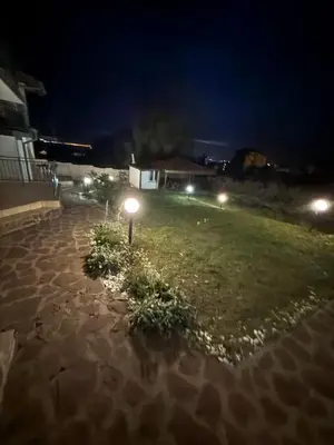 a street light in the middle of a field at night at Serenity Hill-Bulharsko U Nás in Sveti Vlas
