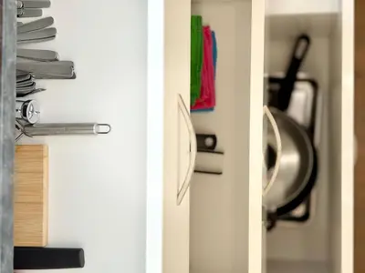 a door to a kitchen with some utensils at Varna Thermae Loft in Varna City