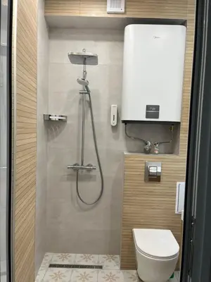a bathroom with a shower and a toilet at Nearby the Sea- Elegant Retreat in Varna in Varna City