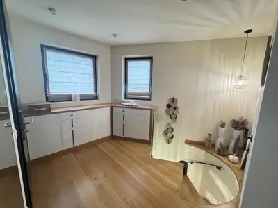 a bathroom with a sink and a tub in a room at Azure View in Burgas City
