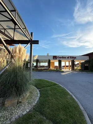 a building with a sign that reads center of park at Garden of Eden studio in Sveti Vlas