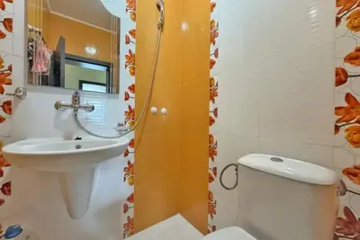a bathroom with a toilet and a sink at Apartments Nessebar in Nesebar