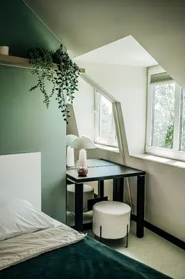 a bedroom with a desk and a table and a chair at The Loft - Parking - Washer&Dryer - Port view - Balcony in Burgas City