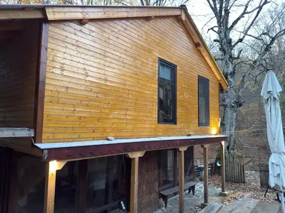 a house that is being built on a porch at Apartment With 2 Bedrooms - Magic Woods