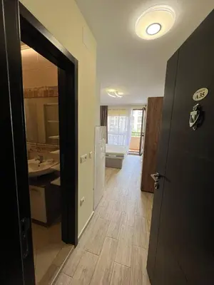 a bathroom with a sink and a toilet and a mirror at Coastera Group Cascadas 8 in Sunny Beach