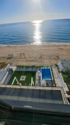 an aerial view of a beach with a swimming pool at LUXE 1 Venezia Suite in Obzor