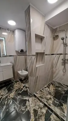 a bathroom with a sink and a toilet at Luxe 1 Dubai Penthouse in Obzor