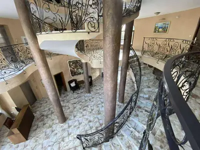 an overhead view of a spiral staircase in a house at Апартамент в затворен комплекс Артур гр Свети Влас in Sveti Vlas
