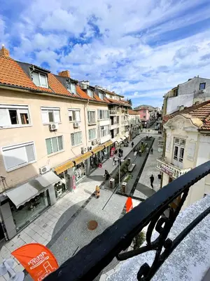a view of a city street with buildings at Velaria Centre Apartment in Burgas City