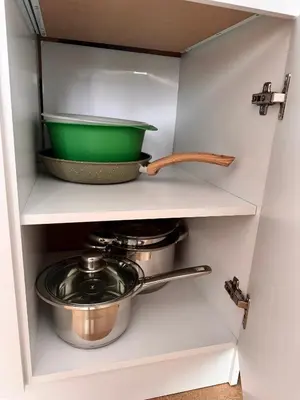 a kitchen drawer with a pot and a pan at Studio Sea Breeze Sveti Vlas ap58 in Sveti Vlas