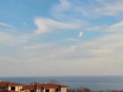 a view of the ocean under a cloudy sky at Garden of Eden - Panorama C15 Rey&Mar in Sveti Vlas