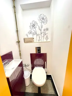 a bathroom with a toilet and a sink at 'Tide Frame' Apartment - Big, Super Central, 2 bathrooms in Burgas City