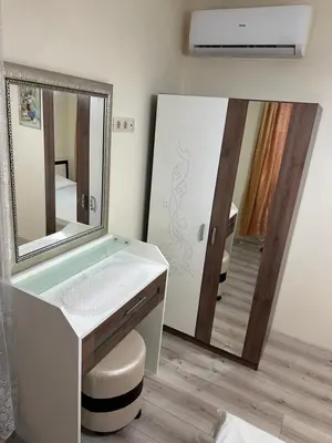 a bathroom with a sink and a mirror at Apartment near the sea in Pomorie