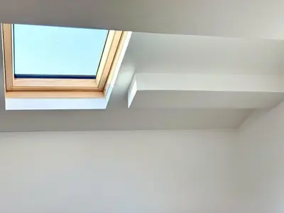 a window in the ceiling of a room at Skyline Loft in Varna City