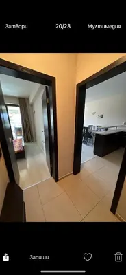 a view of a living room and a dining room at Апартаменти Нино 1 in Sozopol